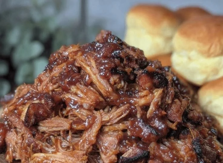 Delicious Dr Pepper pulled pork served with BBQ sauce and coleslaw