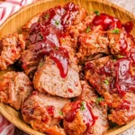 Delicious cranberry glazed pork tenderloin served on a plate