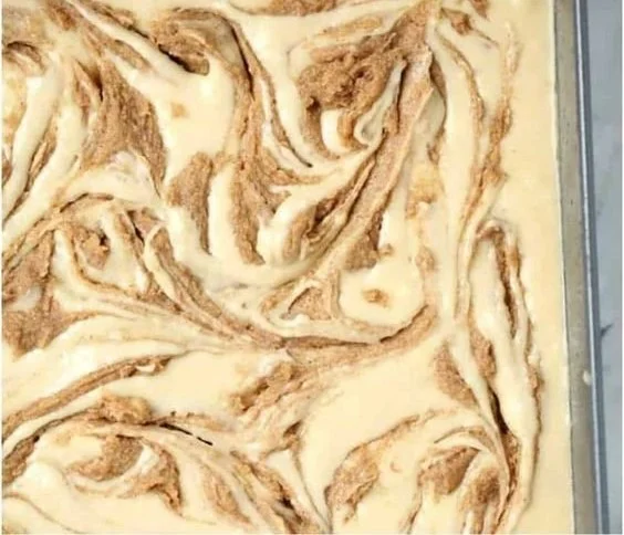 Delicious homemade cinnamon roll cake topped with icing