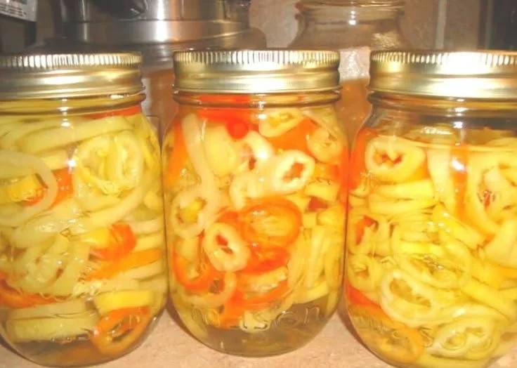 Jars of easy pickled banana peppers ready for serving