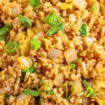 A plate of homemade Hibachi Fried Rice with vegetables and shrimp
