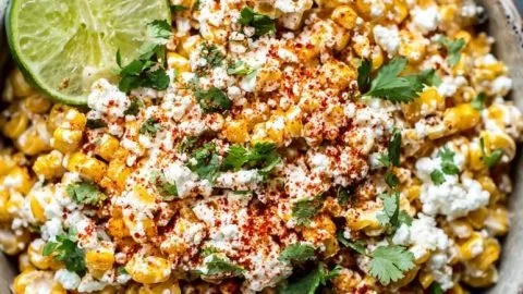 Delicious Mexican street corn recipe with toppings ready to serve.