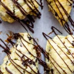 Delicious Mint Chip Scones with chocolate chips and mint leaves