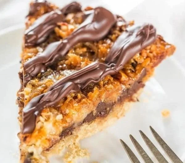 Delicious Samoa Pie with chocolate, caramel, and coconut layers