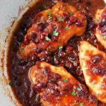 Skillet Orange Cranberry Chicken dish with vibrant colors and delicious sauce