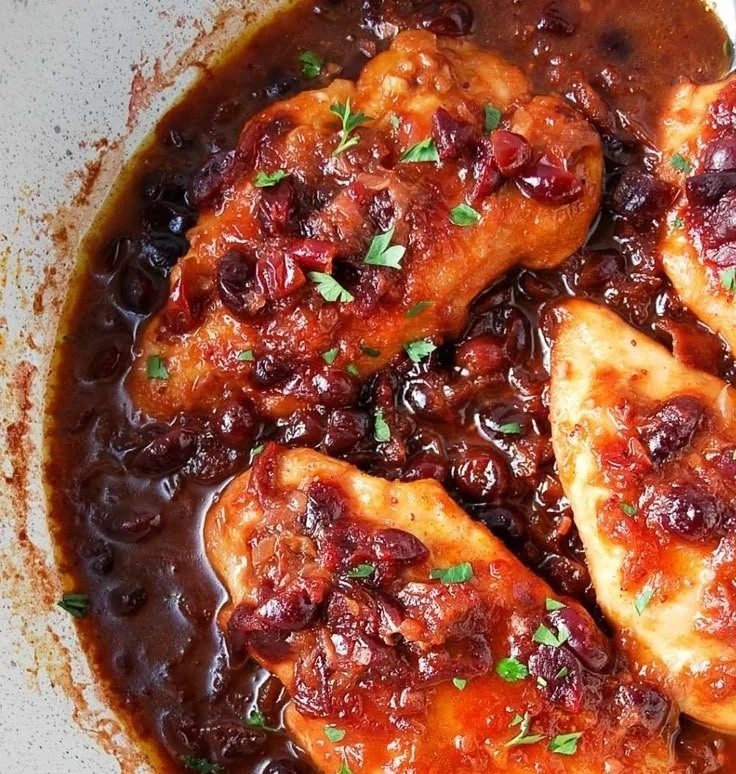 Skillet Orange Cranberry Chicken dish with vibrant colors and delicious sauce