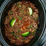 Delicious slow cooker beef barbacoa served with tortillas