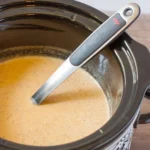 Drinkable pumpkin pie served in a cozy mug, perfect for autumn gatherings.