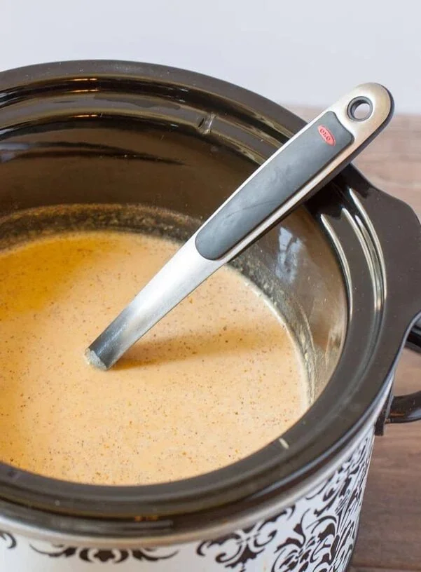 Drinkable pumpkin pie served in a cozy mug, perfect for autumn gatherings.