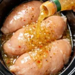 Easy Slow Cooker Italian Chicken recipe with rich flavors and tender chicken.
